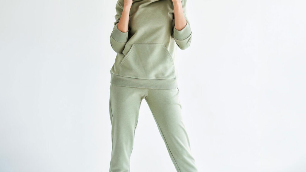 Woman Standing Wearing trouser and hoodie