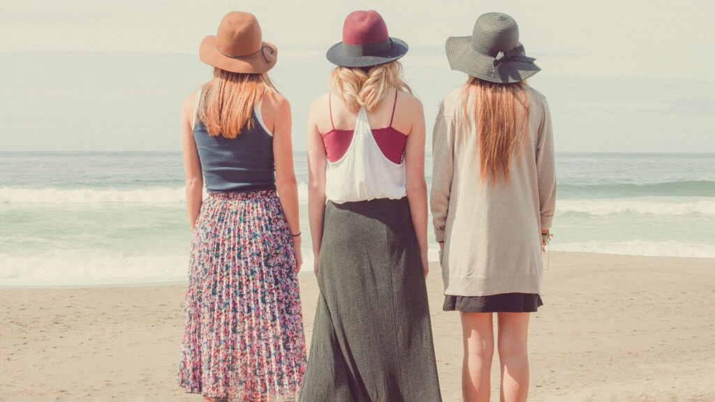 Three Friends living Wonderful Life 
Enjoying At Beach.