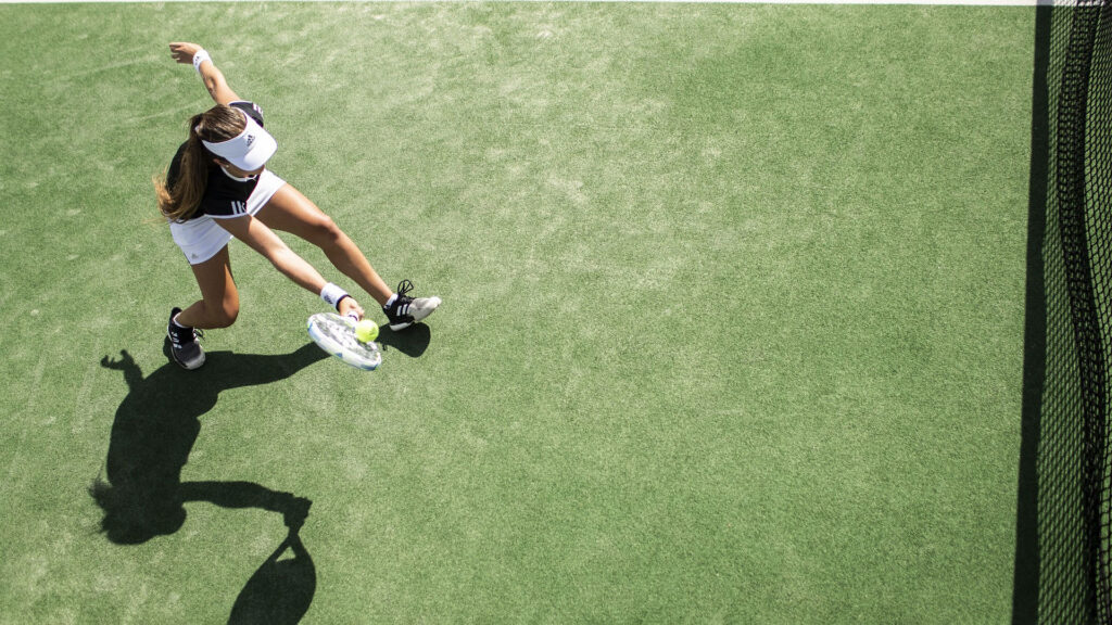 Woman doing Foot Fault While playing tennis.