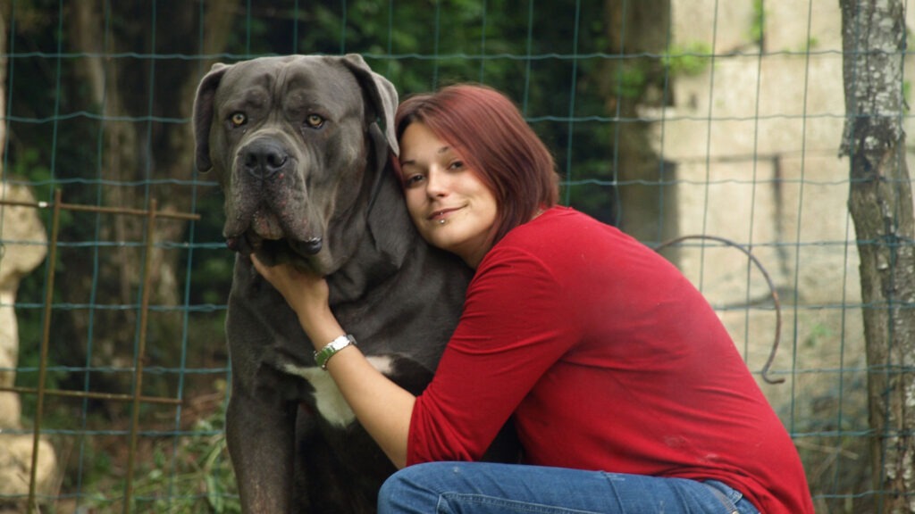 Woman Sitting With His Dog